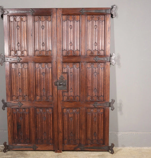 Pair of French Antique Neo Gothic Cabinet Doors in Oak Wood Linen Fold Carvings